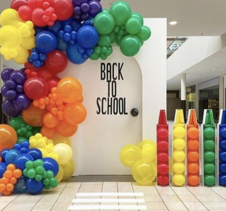 Colorful back to school balloon decorations with balloon garland in NYC