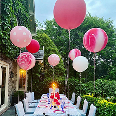 Pink balloon decorations for an outdoor party in NYC