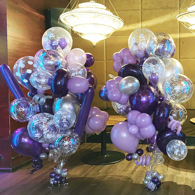 Purple and silver custom balloon decorations with confetti balloons in NYC