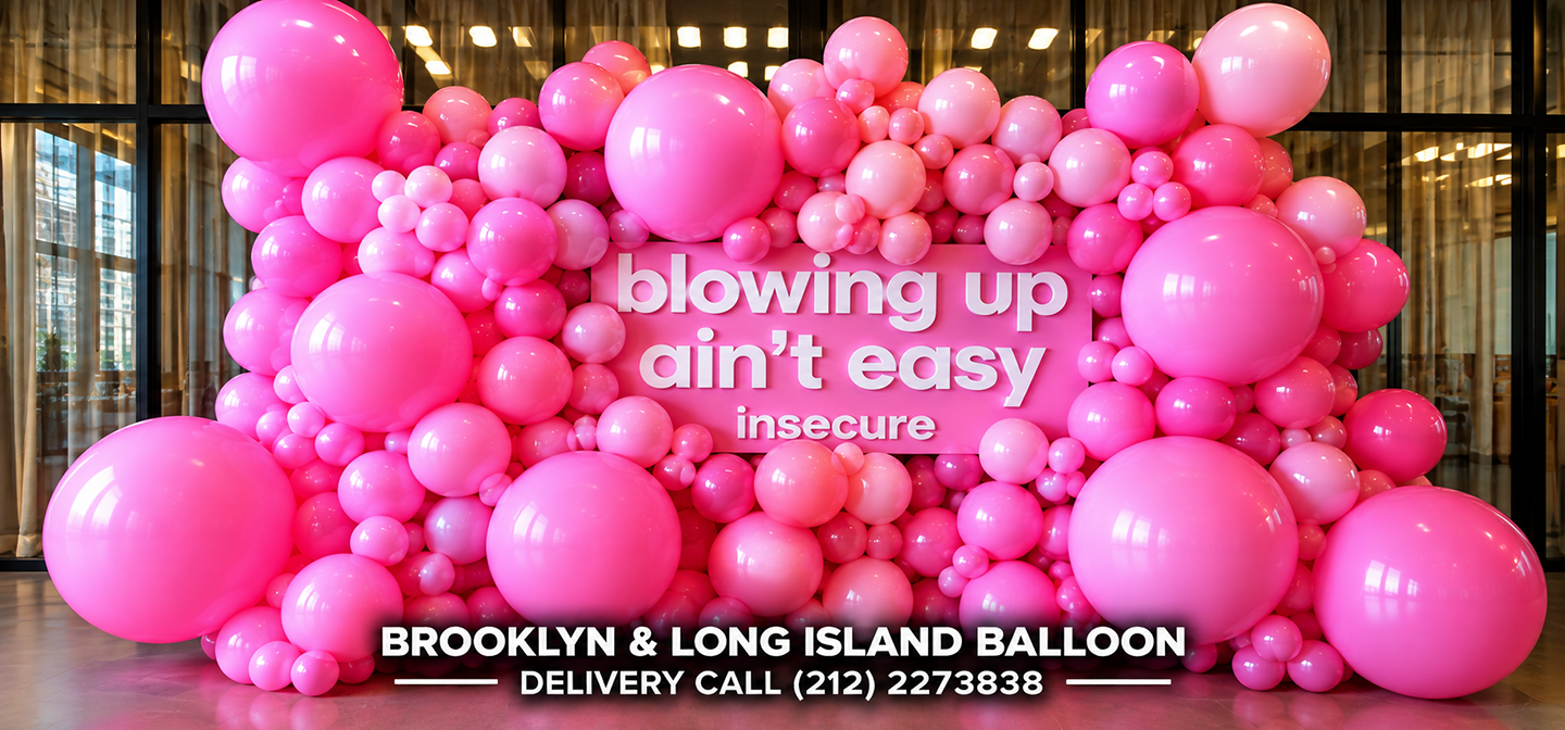 Pink balloon wall event backdrop in New York City by Balloon Saloon