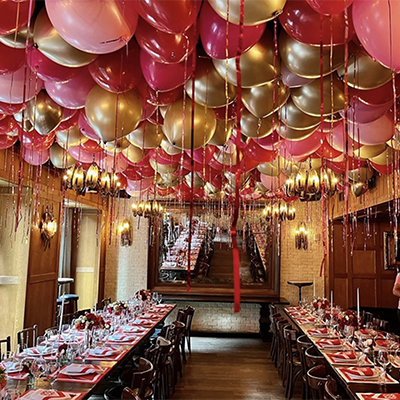 Pink and gold balloon ceiling decorations for a private event in NYC