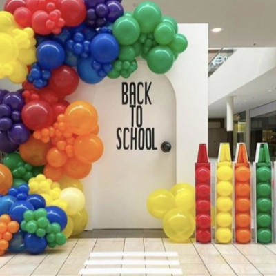 Colorful back to school balloon decorations with balloon garland in NYC